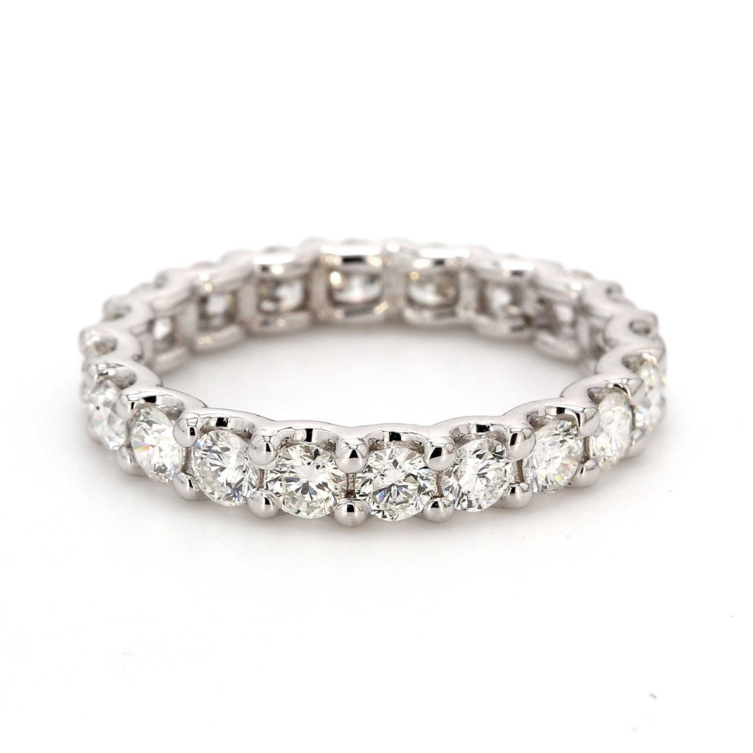 Eternity band with shared 4-prong set (21) round diamonds.  D1.87ct.t.w.  Size 6
