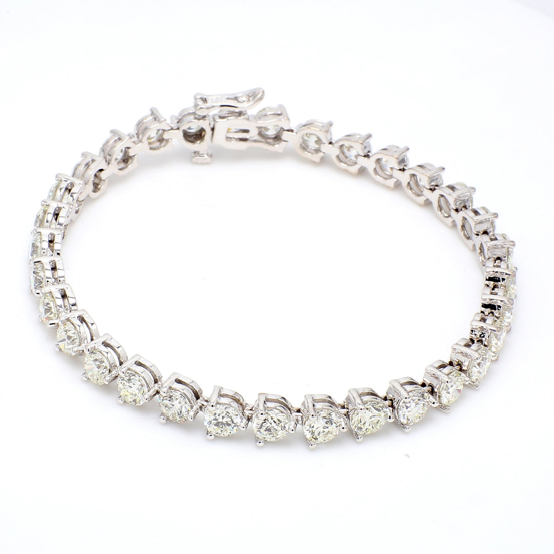 7"" Tennis bracelet with 3-prong set (32) round diamonds.  D12.41ct.t.w.