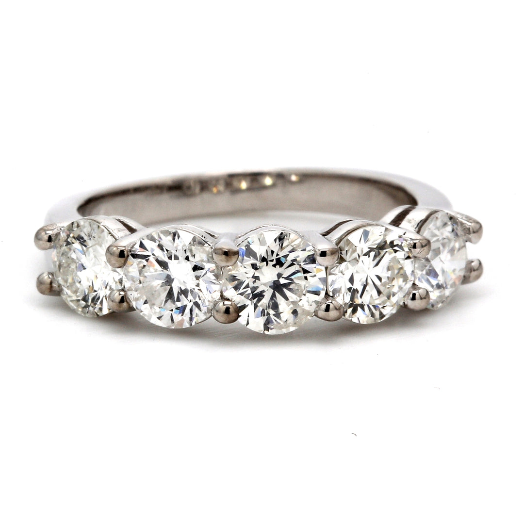 5-stone band with shared prong set round diamonds.  D2.28ct.t.w.  Size 6.5
