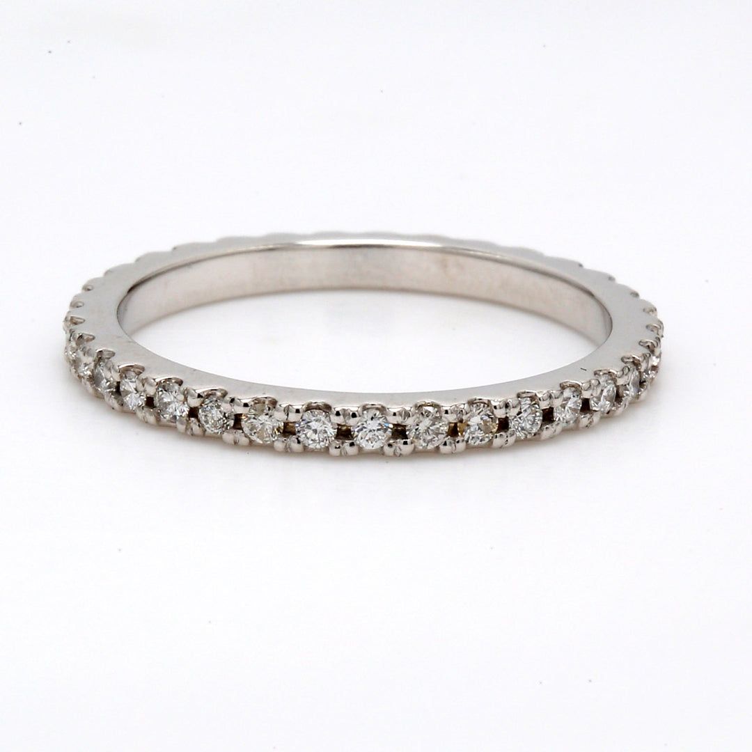 Eternity band with shared U-prong set (35) round diamonds.  D0.41ct.t.w.  Size 6.25