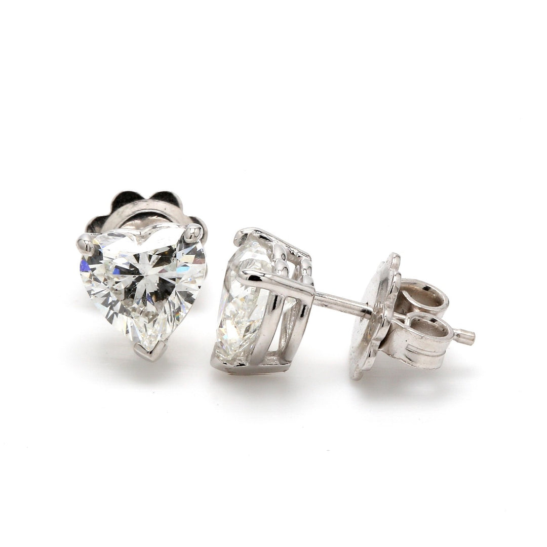 Push back stud earrings with 3-prong set GIA certified G/SI2 heart shape diamonds.  D2.03ct.t.w.