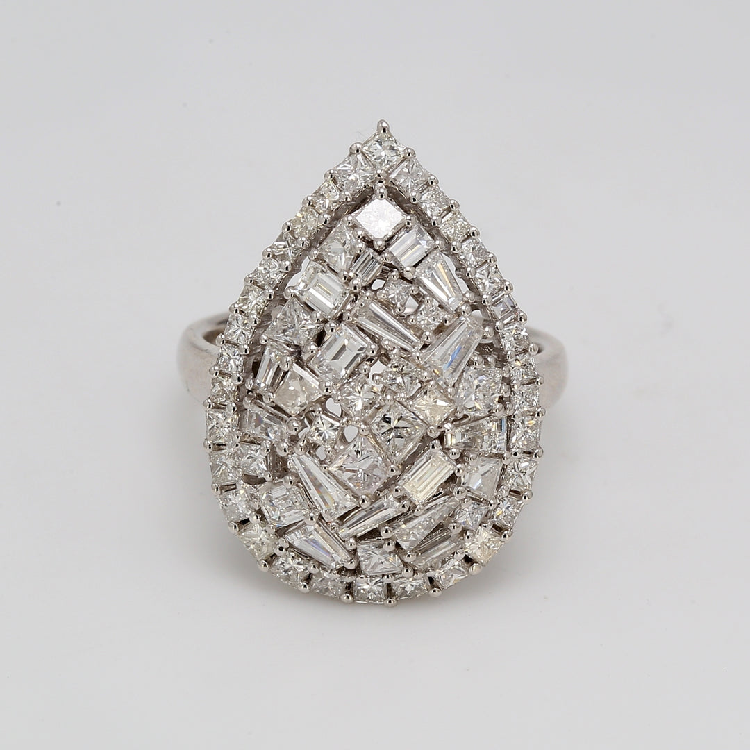 Halo pear shaped ring in 18K WG with prong set assorted shape diamonds.  D2.67ct.t.w.  Size 6.75