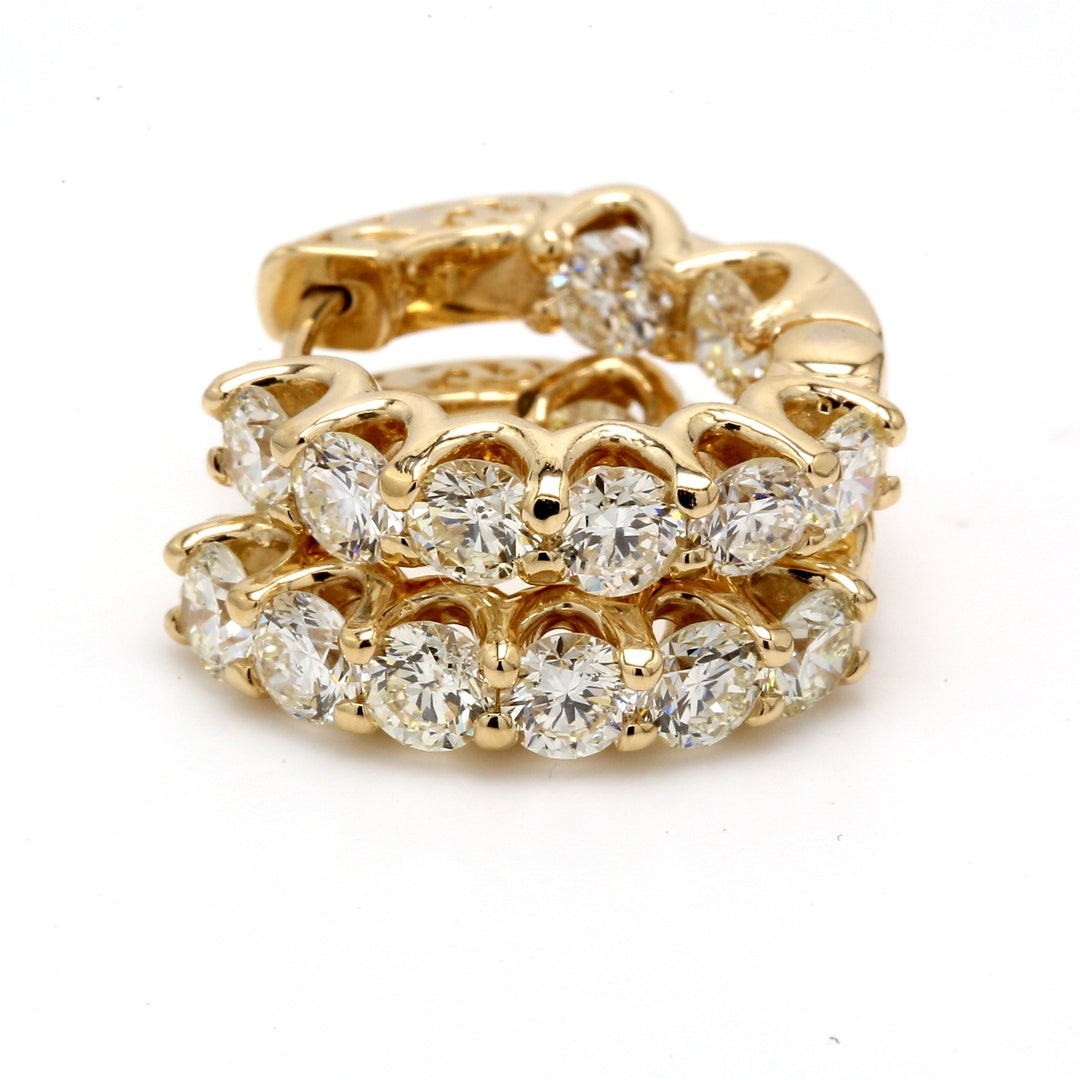 0.75"" Inside out hoop earrings in yellow gold with shared U-prong set (16) round diamonds & with special spring lock.  D3.90ct.t.w.