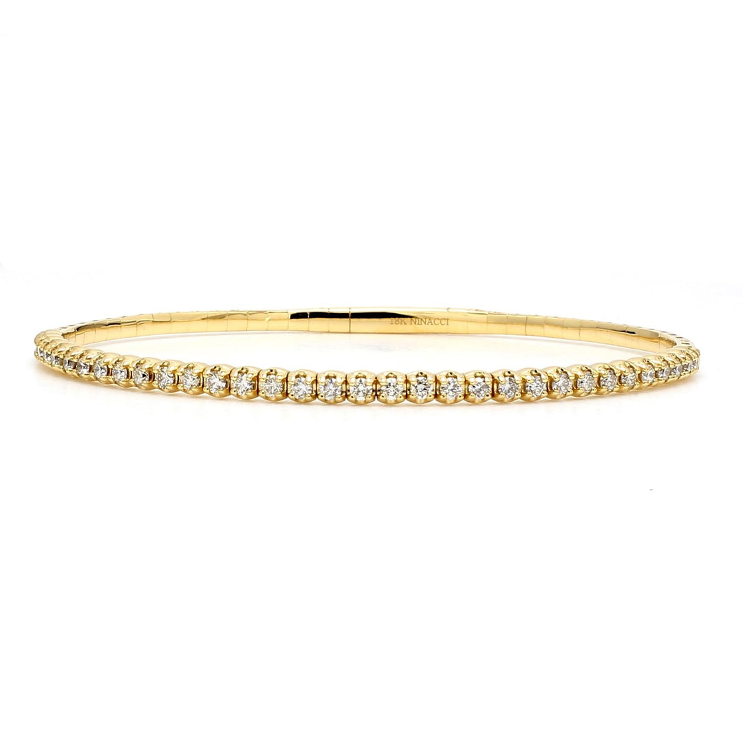 6.5"" Light weight flexible oval shaped bangle in 18K YG with prong set round diamonds.  D1.00ct.t.w.