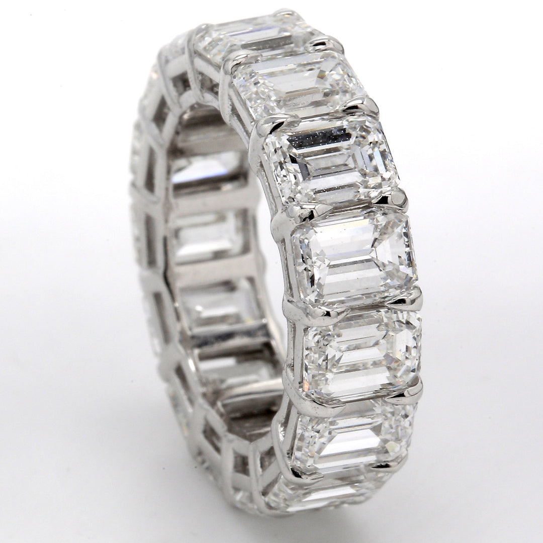 Eternity band in platinum with shared prong basket set GIA certified D-G/VVS2-VS1 (15) emerald cut diamonds.  D11.01ct.t.w.  Size 5.5