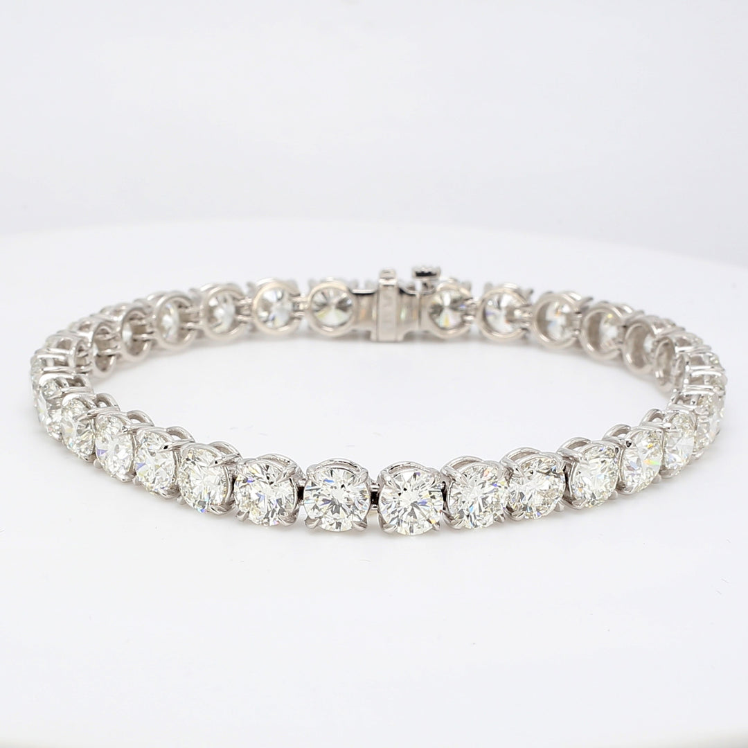 7"" Tennis bracelet in platinum with 4-prong basket set G-H/VS2-SI1 (31) round diamonds.  D21.85ct.t.w.