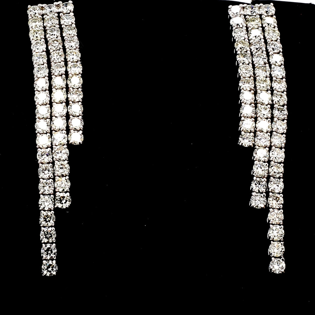Push back 3-row dangling earring with 4-prong set (90) round diamonds.  D4.26ct.t.w.