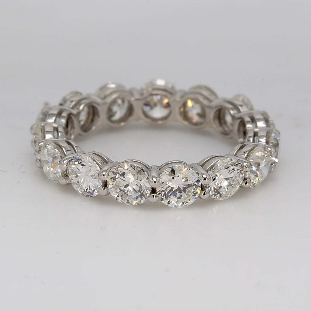 Etenity band in platinum with double basket shared prong set round diamonds.  D3.56ct.t.w.  Size 5.25