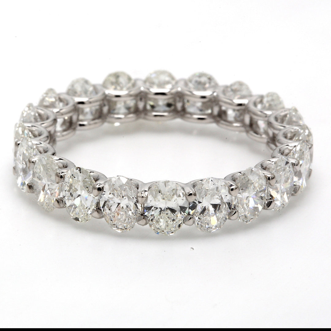 Eternity band with shared U-prong set (20) oval cut diamonds.  D6.12ct.t.w.  Size 10
