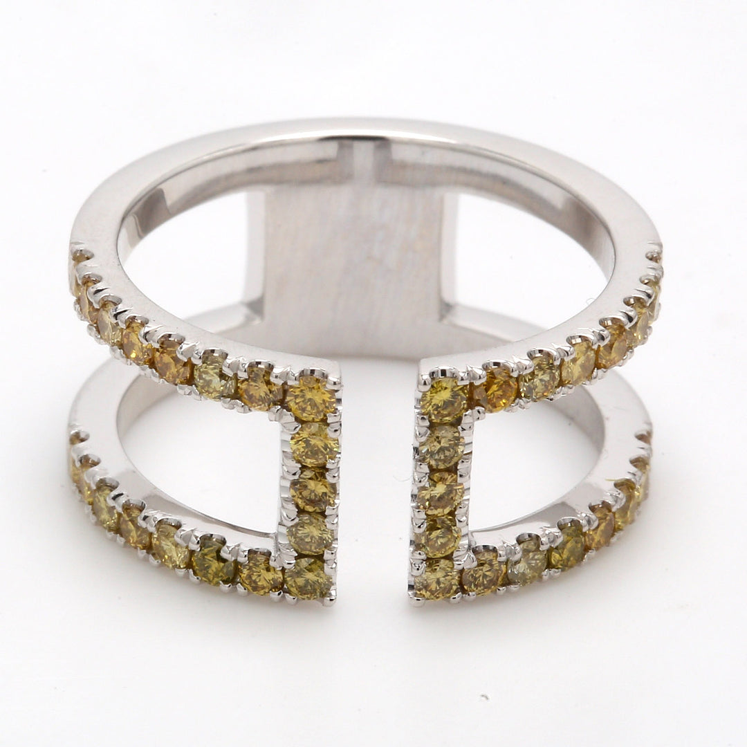 Wide band with prong set FY (38) round diamonds.  D0.99ct.t.w.  Size 7.5