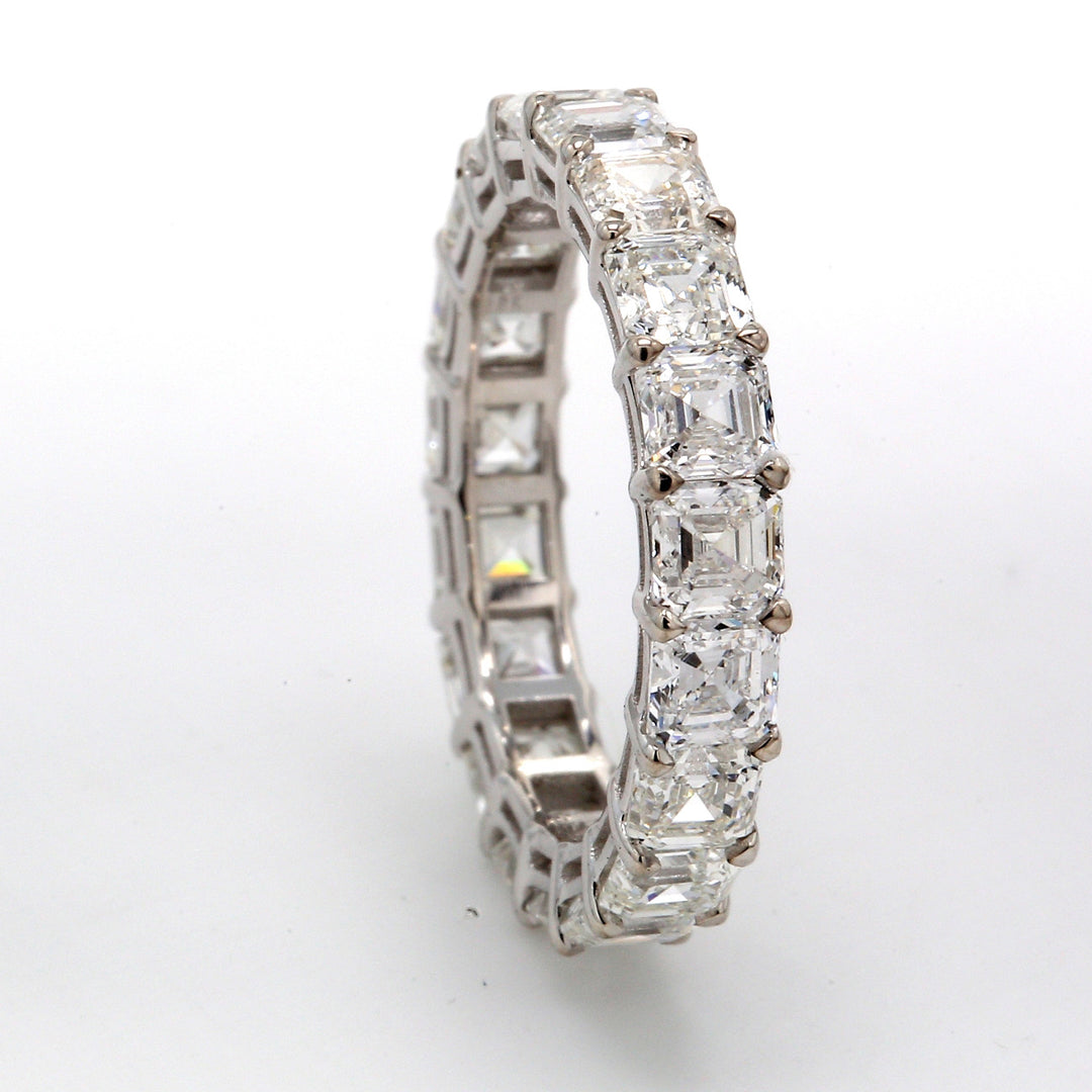 Eternity band in 18K WG with prong set (19) asscher cut diamonds.  D3.55ct.t.w.  Size 4