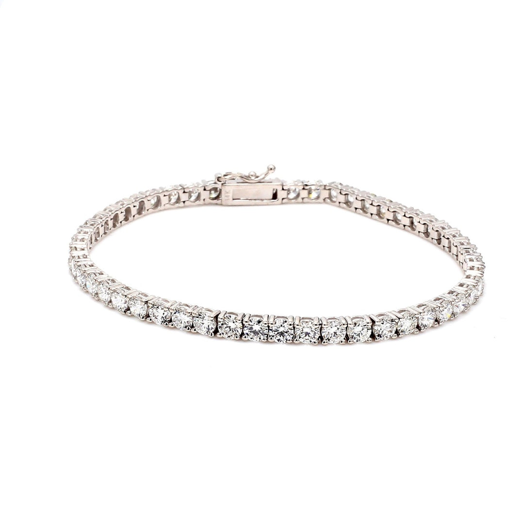 7"" Tennis bracelet 4-prong basket set (51) round diamonds.  D7.36ct.t.w.