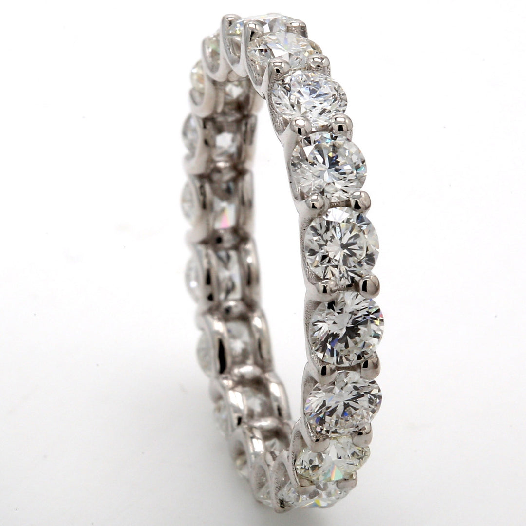 Eternity band in 18K WG with U-prong set (18) round diamonds.  D2.75ct.t.w.  Size 6