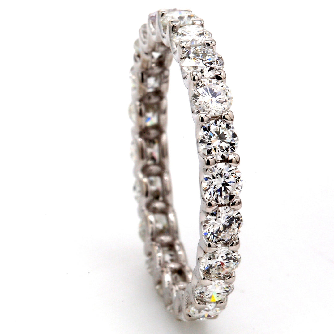 Eternity band in 18K WG with U-prong set (22) round diamonds.  D1.91ct.t.w.  Size 6.75