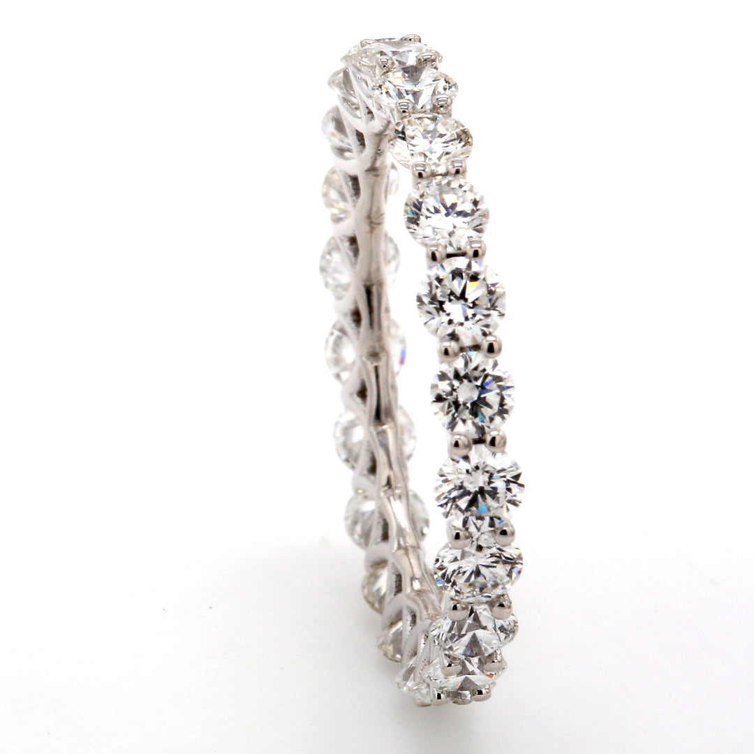 Eternity band in 18K WG with prong set (22) round diamonds.  D2.07ct.t.w.  Size 6