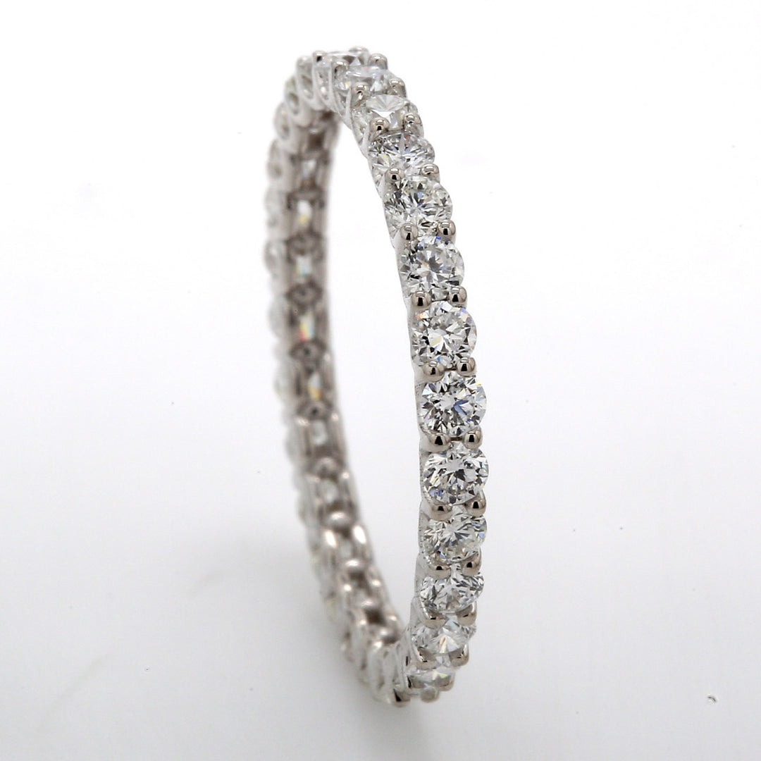 Eternity band in 18K WG with prong set (29) round diamonds.  D1.12ct.t.w.  Size 6.5
