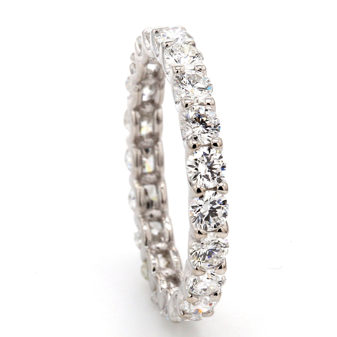 Eternity band in 18K WG with U-prong set (21) round diamonds.  D1.83ct.t.w.  Size 6