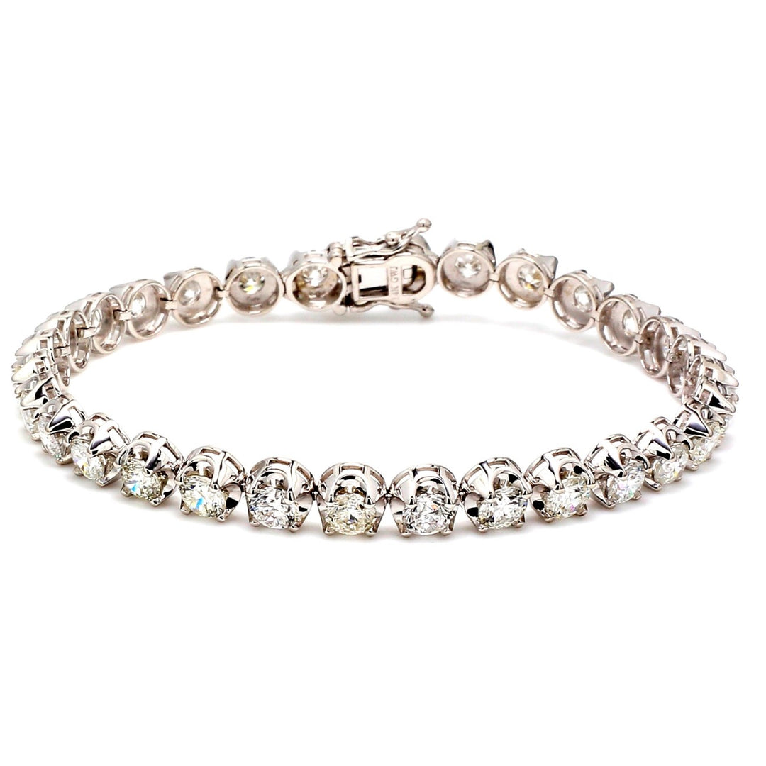7.5"" Tennis bracelet with crown head prong set (30) round diamonds.  D9.36ct.t.w.