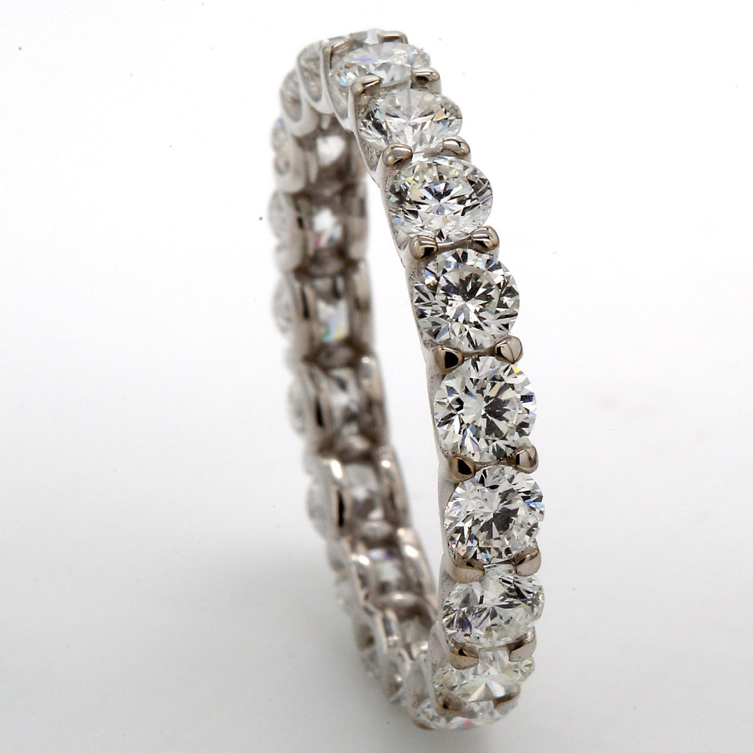 Eternity band in 18K WG with U-prong set (19) round diamonds.  D2.85ct.t.w.  Size 7