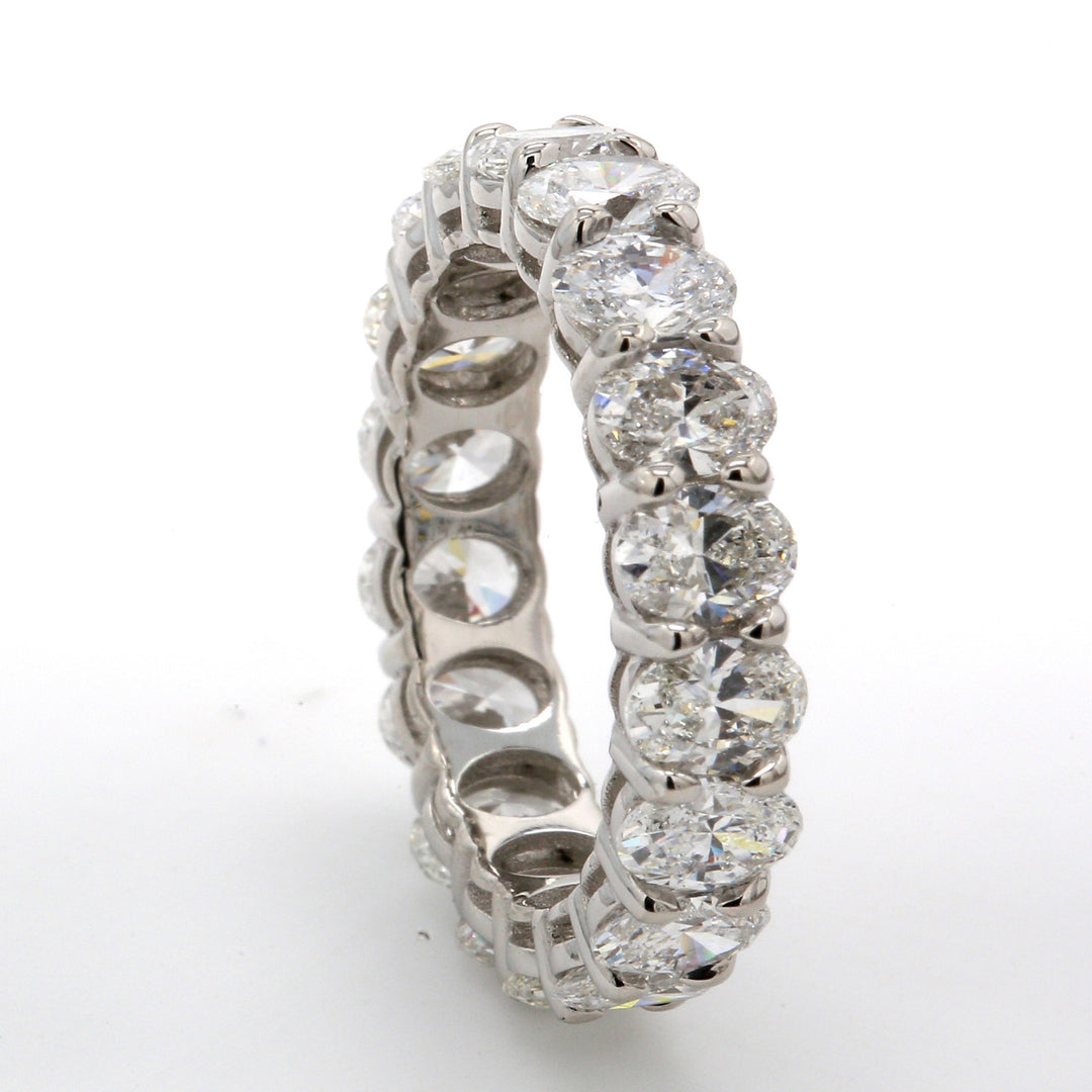 Eternity band in platinum with prong set (18) oval cut diamonds.  D3.55ct.t.w.  Size 5