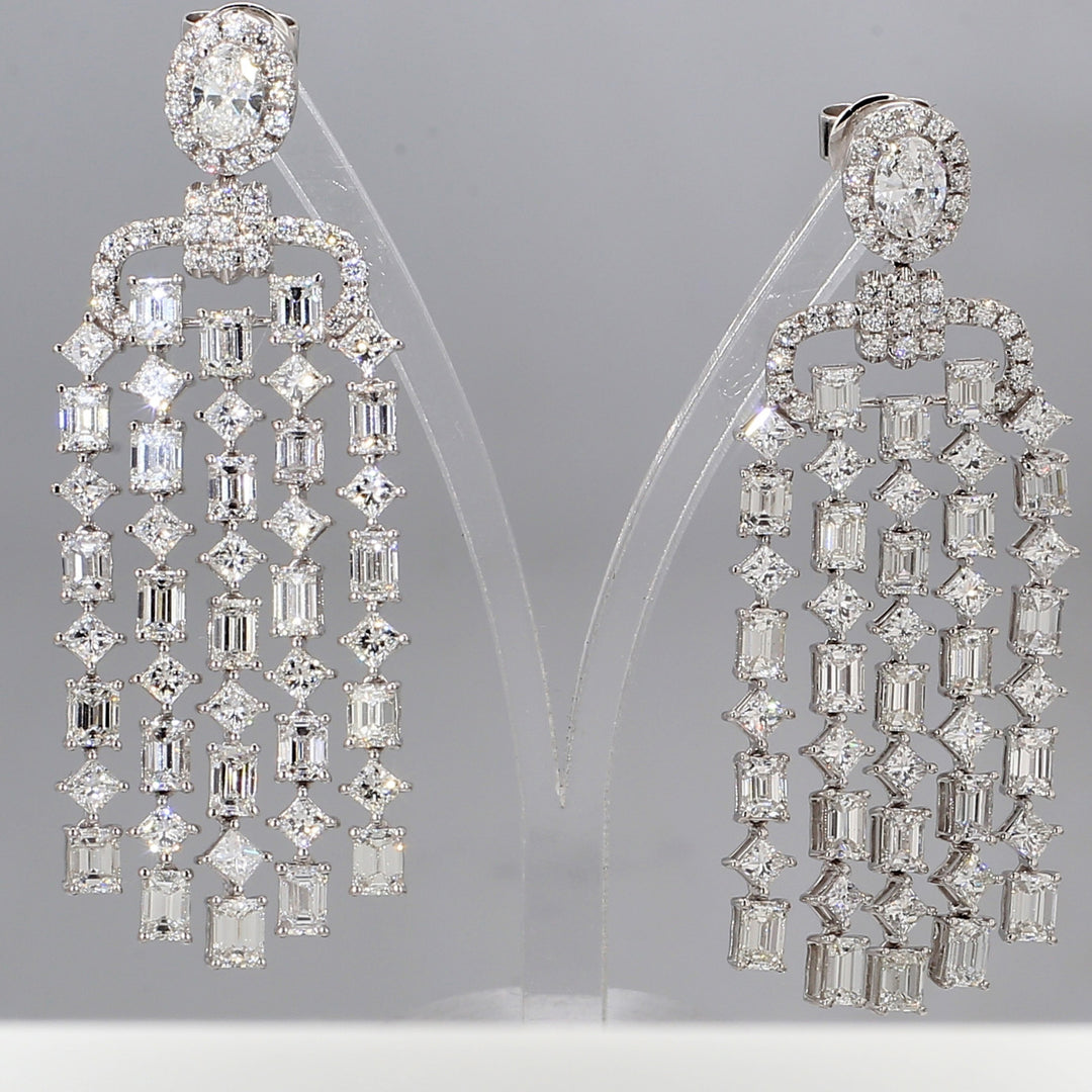 2"" Chandelier earrings in 18K WG with halo oval diamonds on top & prong set 5-row alternating emerald cut and princess cut diamonds.  D10.56ct.t.w.