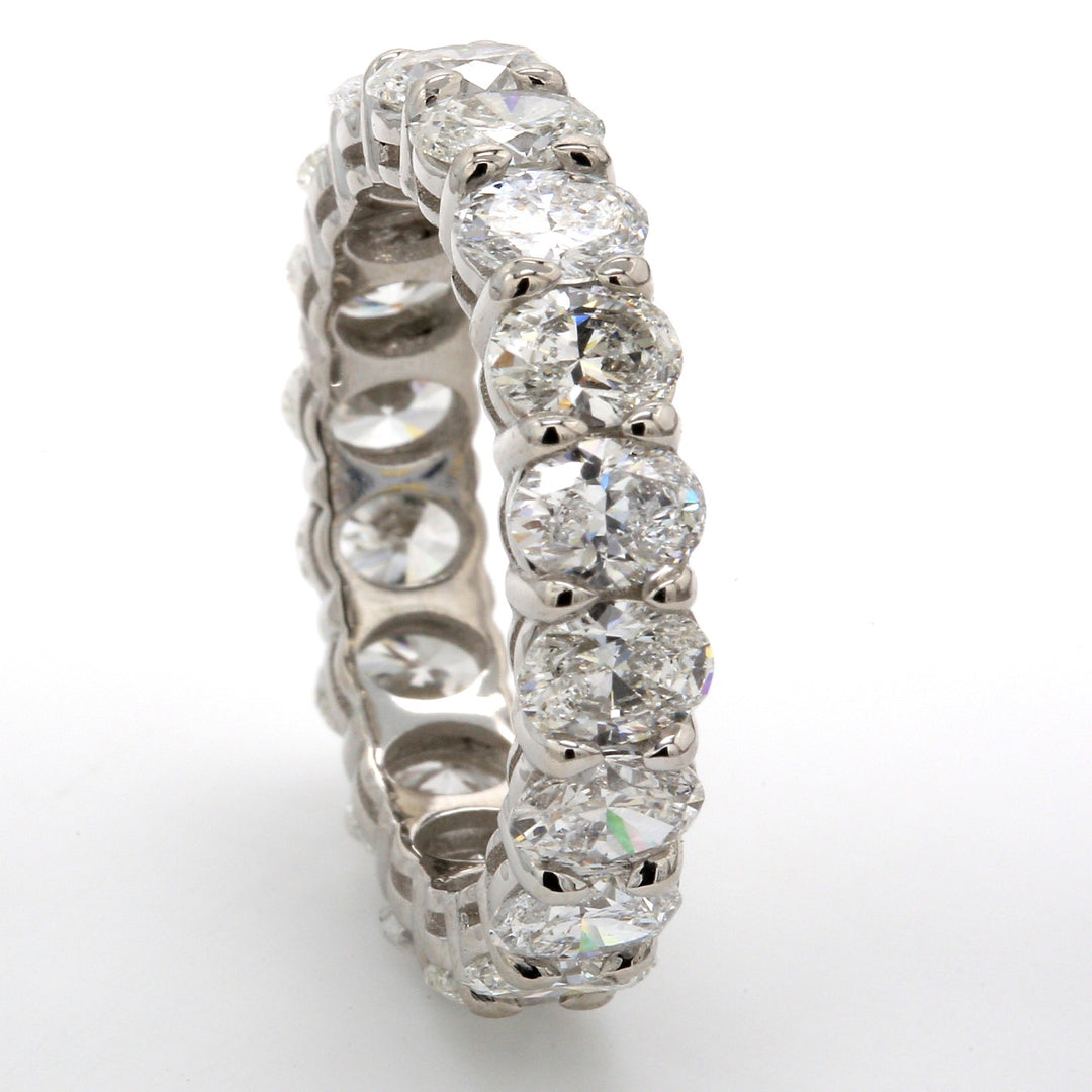 Eternity band with shared prong set (18) oval cut diamonds.  D4.35ct.t.w.  Size 6.5