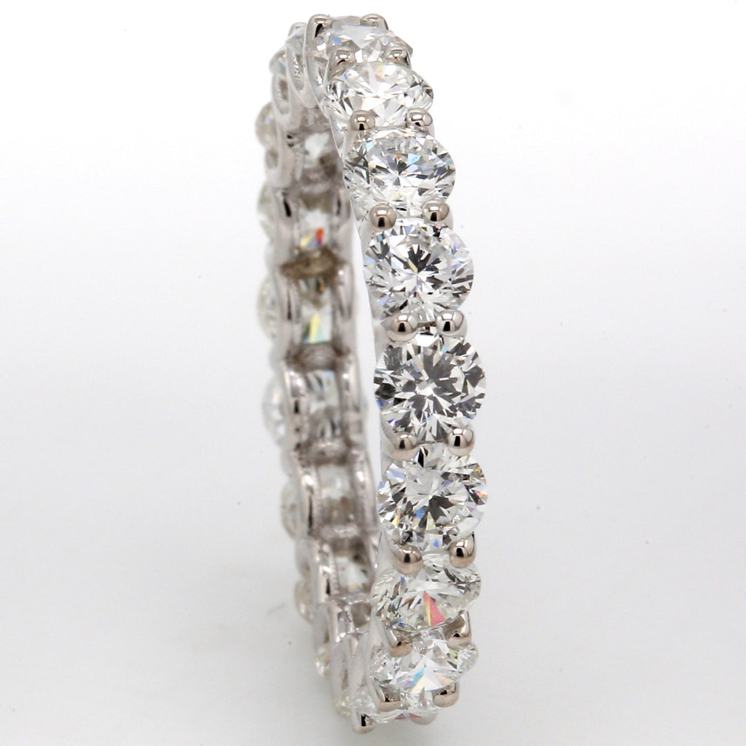 Eternity band in 18K WG with U-prong set (19) round diamonds.  D2.93ct.t.w.  Size 5.75