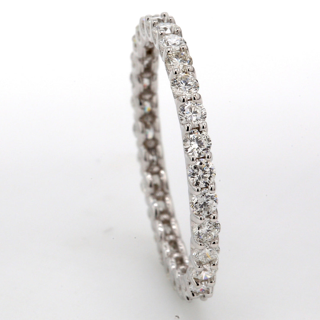 Eternity band in 18K WG with U-prong set (29) round diamonds.  D0.86ct.t.w.  Size 5.75