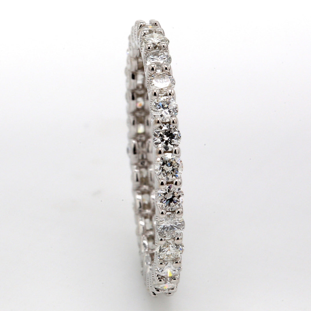 Eternity band in 18K WG with U-prong set (29) round diamonds.  D0.86ct.t.w.  Size 5.25