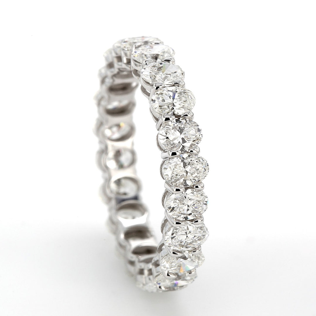Eternity band with shared prong set oval diamonds.  D3.08ct.t.w.  Size 6.5