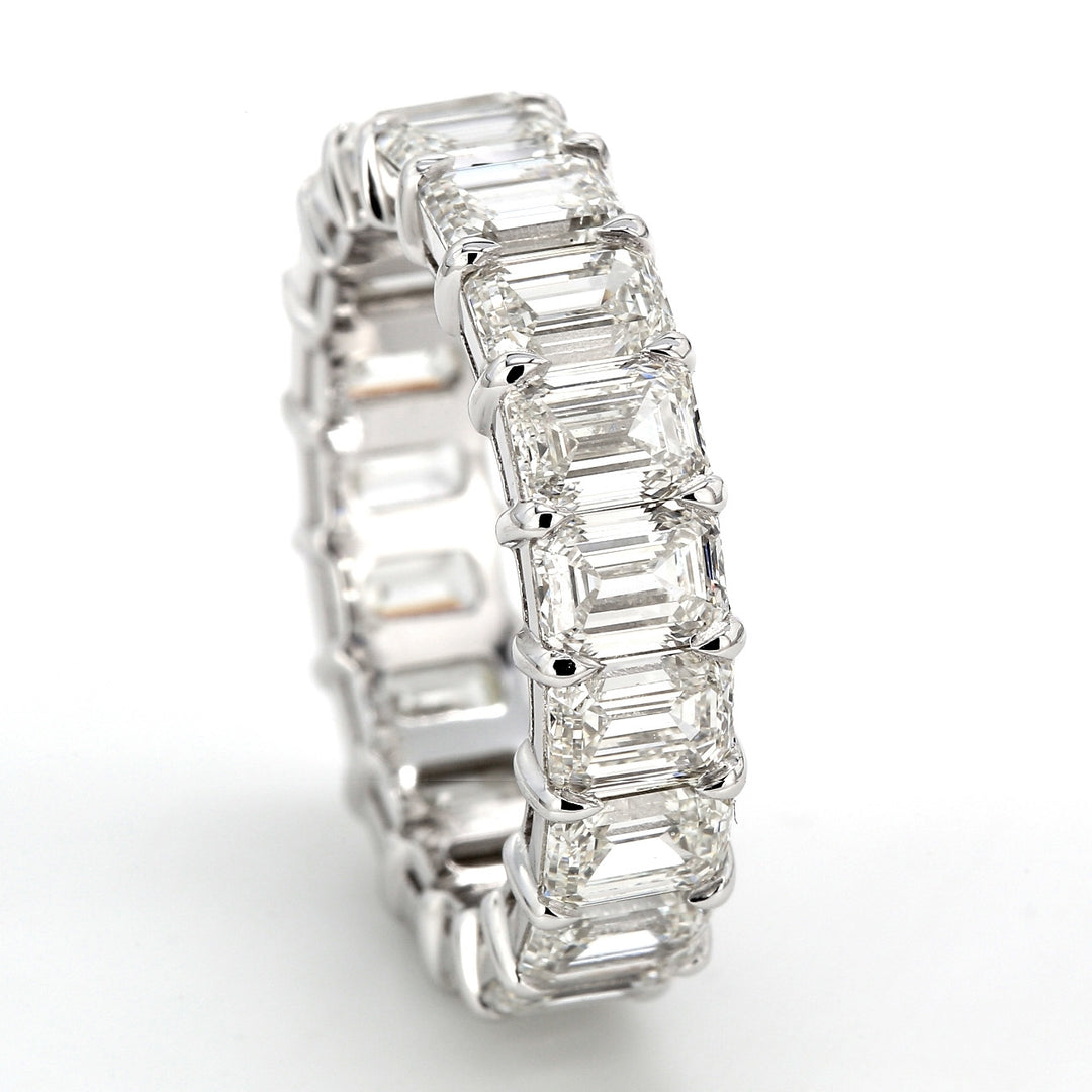 Eternity band in platinum with double basket shared prong set GIA certified G-I/IF-VS2 emerald cut diamonds.  D7.67ct.t.w.  Size 6.5