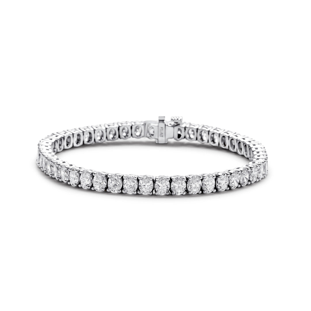 7"" Tennis bracelet in platinum with 4-prong set oval diamonds.  D11.15ct.t.w.