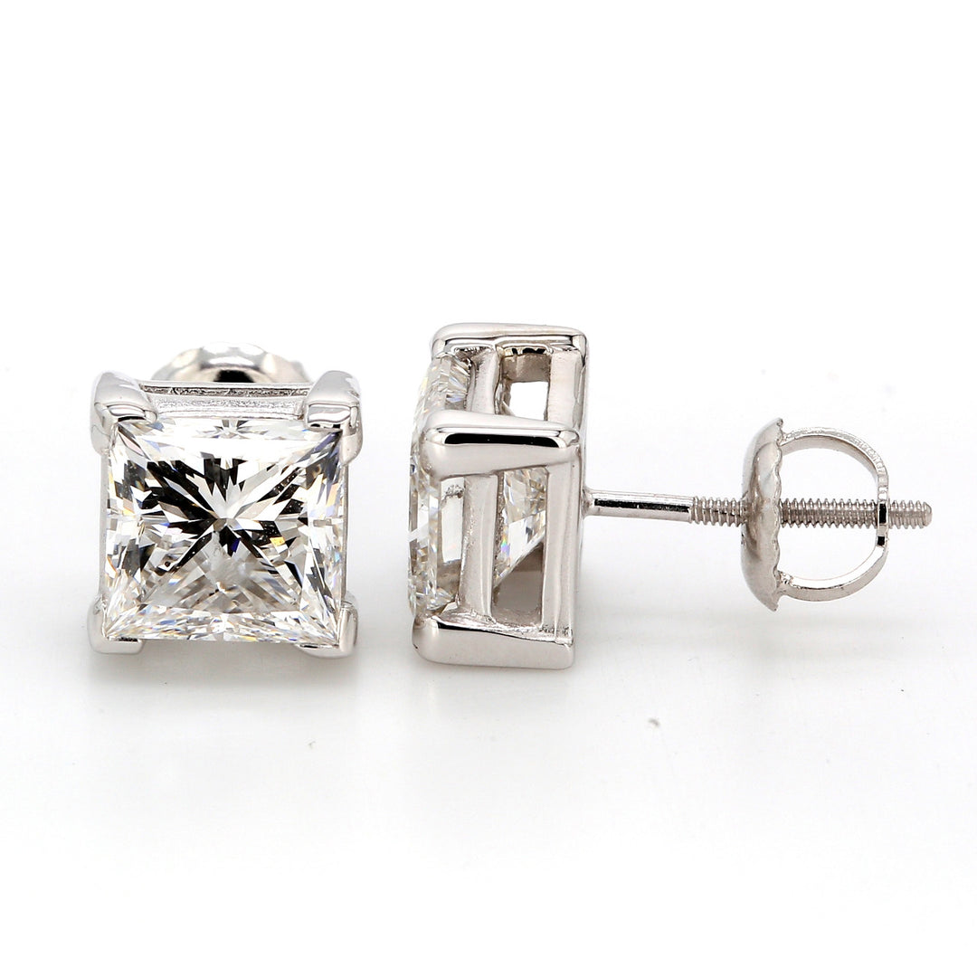 Stud earrings with prong set GIA certified E/I1-I2 princess cut diamonds.  D3.28ct.t.w.