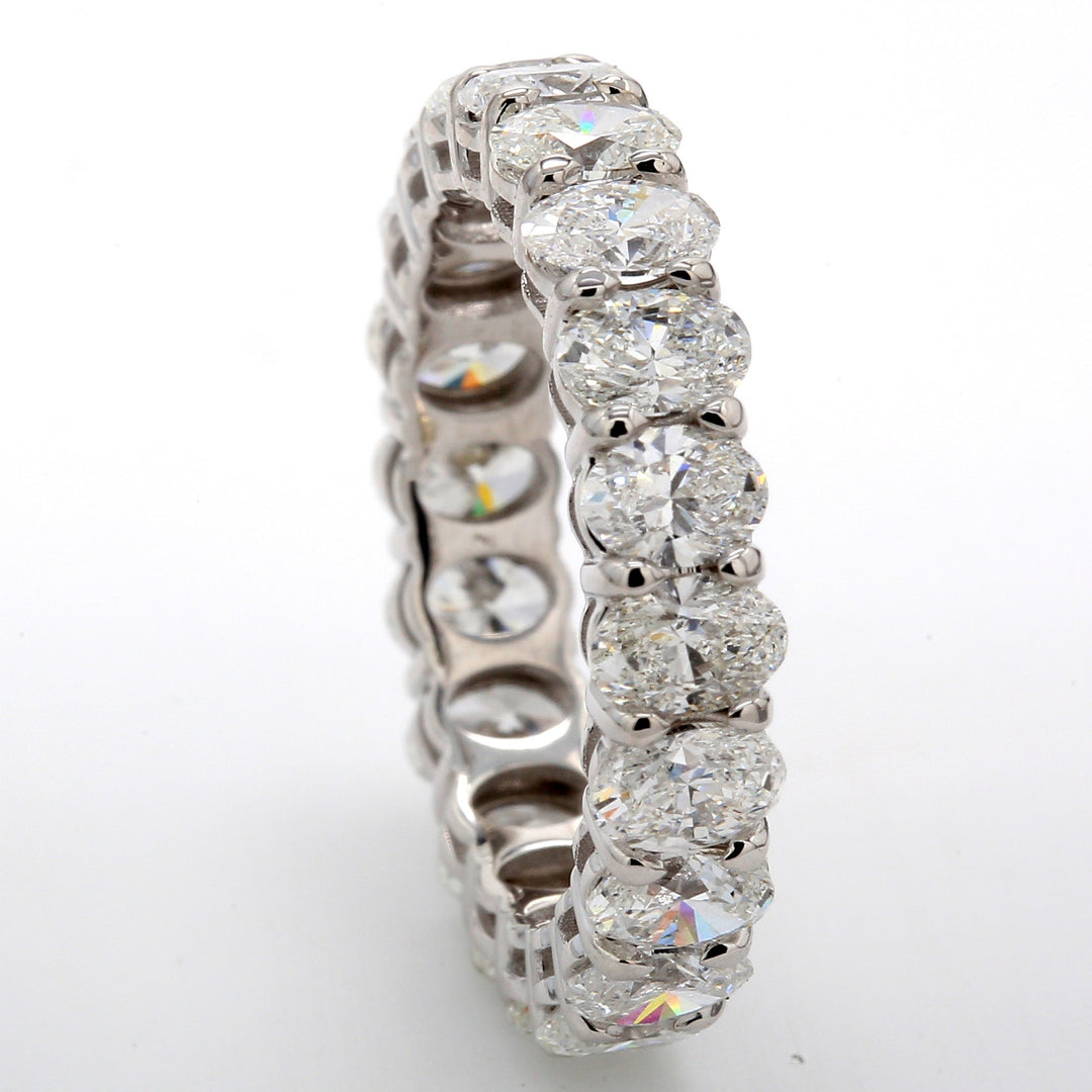 Eternity band in 18K WG with shared basket set (20) oval diamonds.  D3.61ct.t.w.  Size 6