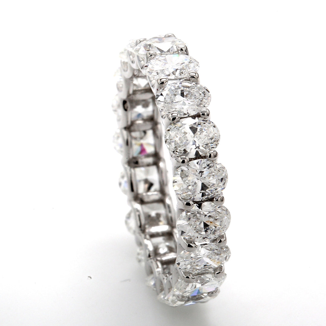 Eternity band with shared U-prong set (19) oval diamonds.  D3.43ct.t.w.  Size 5.25