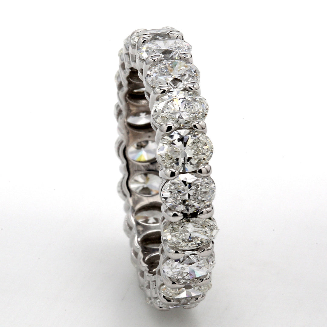 Eternity band in platinum with shared prong set (20) oval diamonds.  D3.55ct.t.w.  Size 5.5
