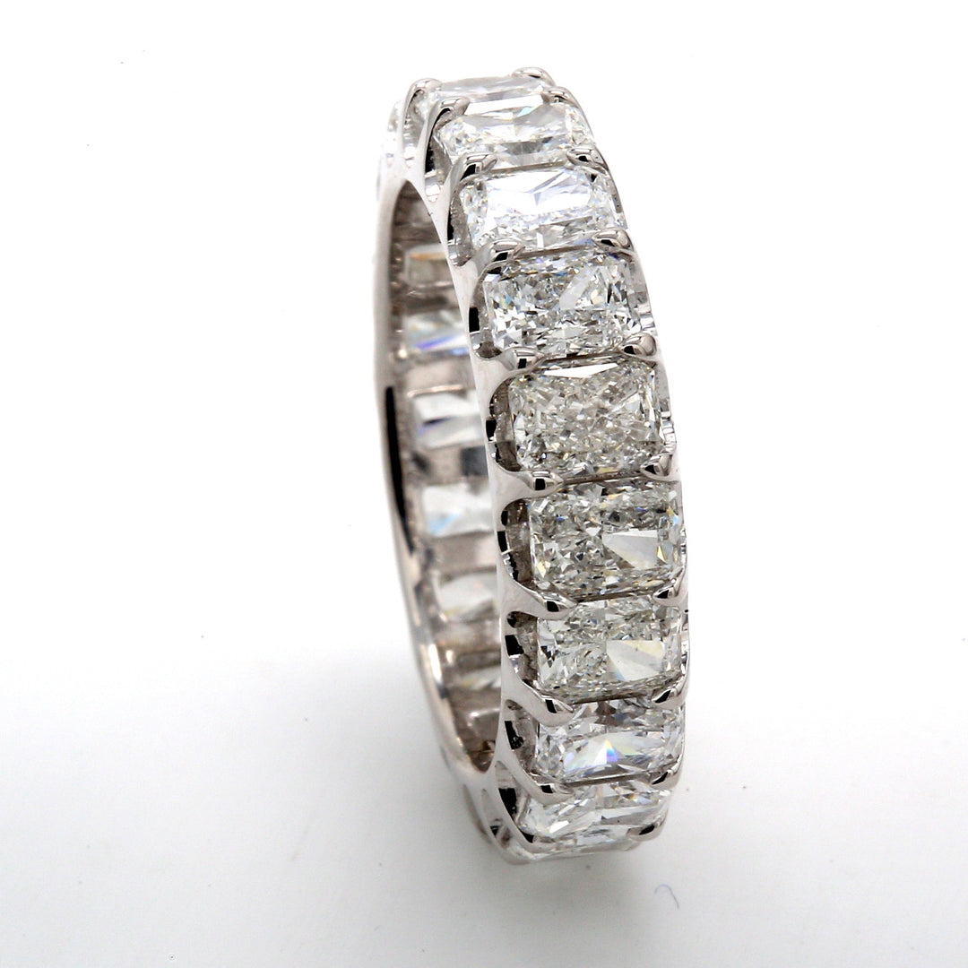 Eternity band in platinum with U-prong set (20) radiant cut diamonds.  D4.84ct.t.w.  Size 5.75