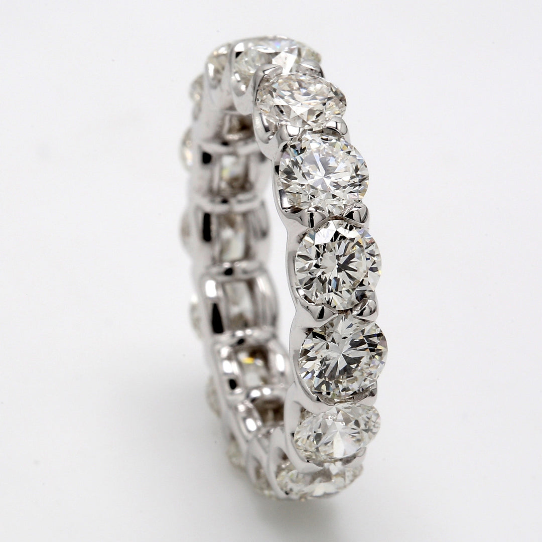Eternity band in 18K WG with claw prong set (15) round diamonds.  D4.52ct.t.w.  Size 5