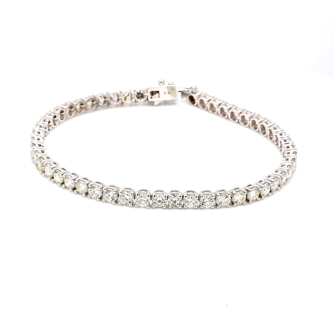 7"" Tennis bracelet with 4-prong set (51) round diamonds.  D7.37ct.t.w.