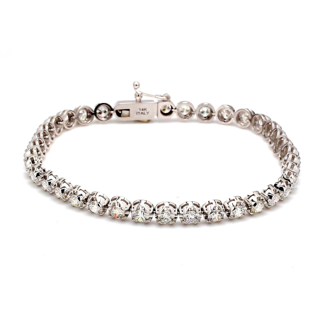 7"" Tennis bracelet with crown head 4-prong set (38) round diamonds.  D5.49ct.t.w.