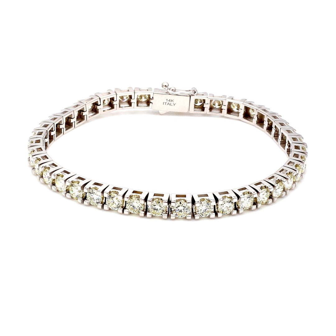 7"" Tennis bracelet with prong basket set (404) round diamonds.  D7.47ct.t.w.