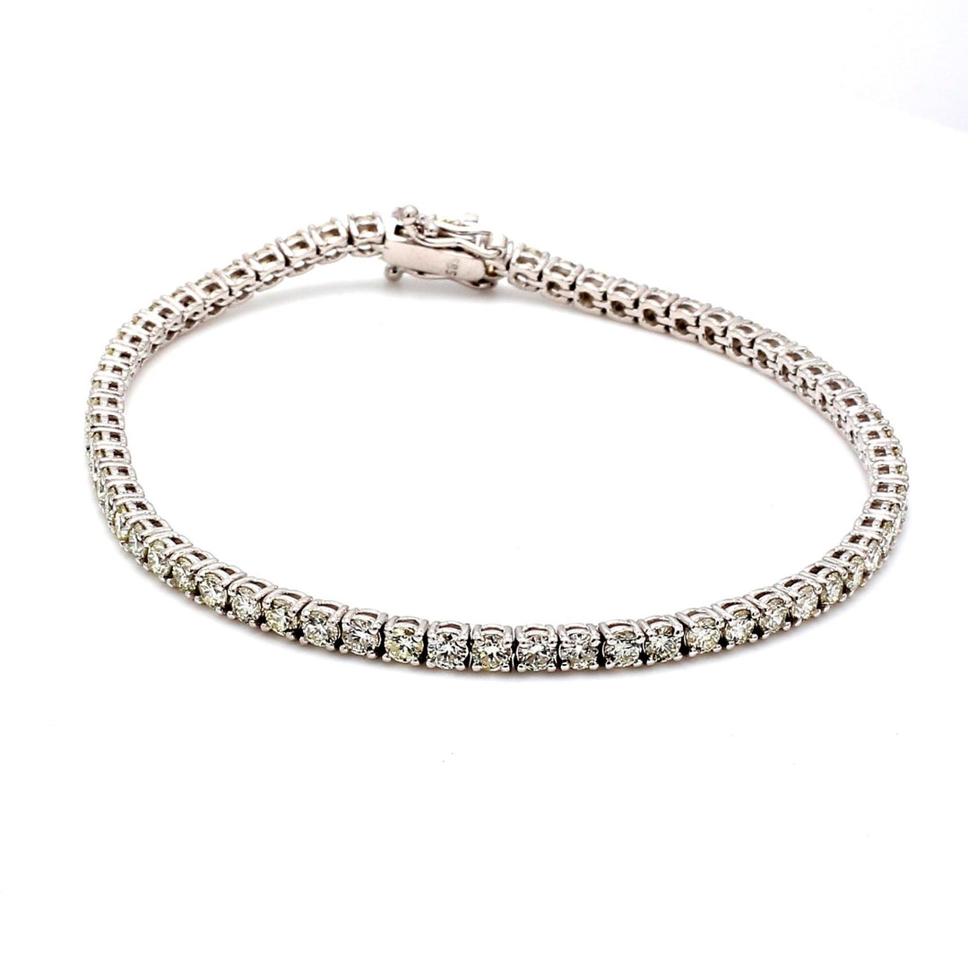 7.25"" Tennis bracelet with 4-prong set (65) round diamonds.  D4.22ct.t.w.