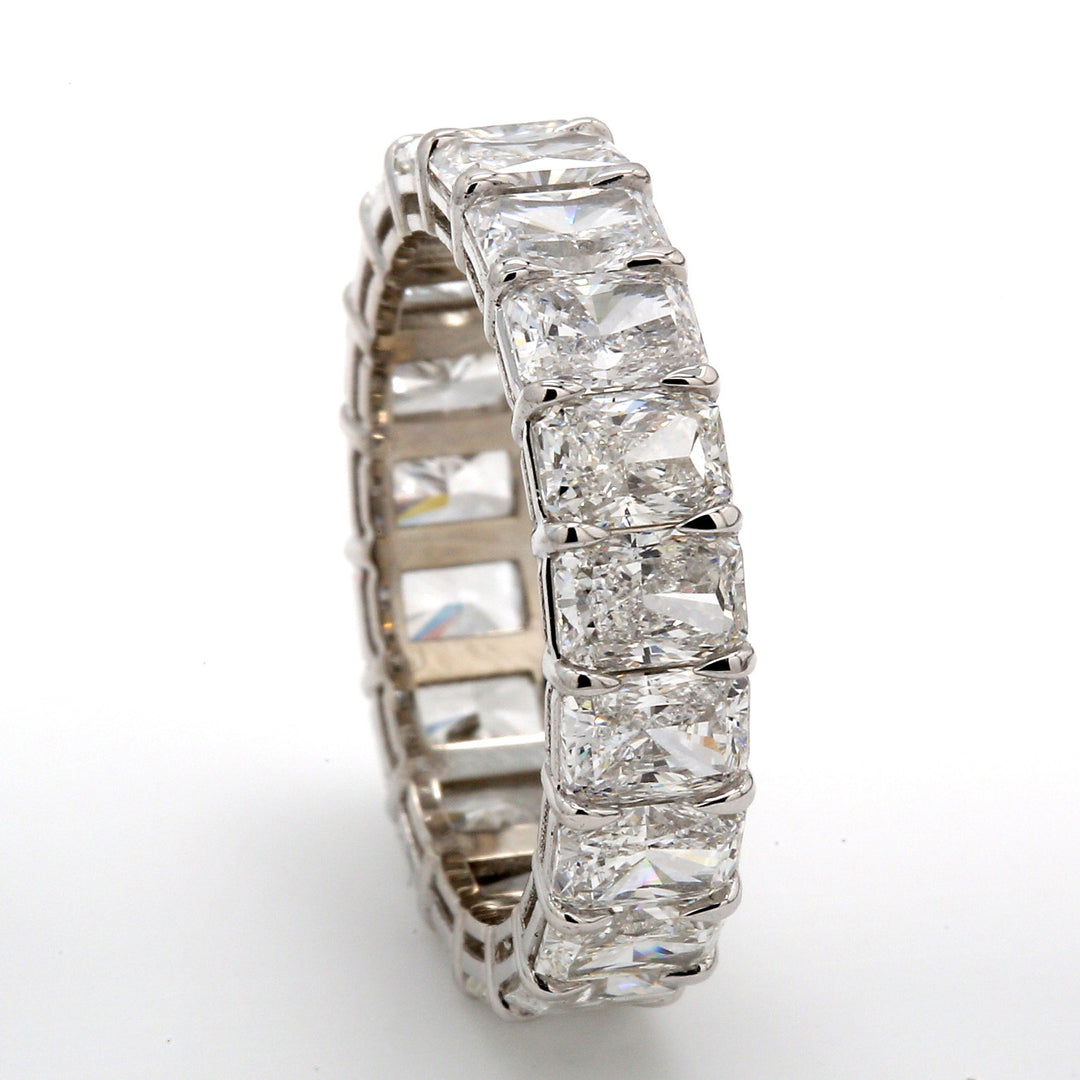 Eternity band in platinum with basket prong set (19) radiant cut diamonds.  D4.79ct.t.w.  Size 5