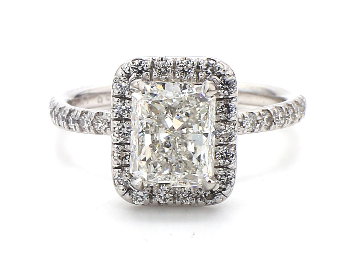 Halo ring in platinum with rounds around USA certified H/SI1 radiant cut diamond center.  D2.96ct.t.w.  (Center 2.50ct.)  Size 6.75