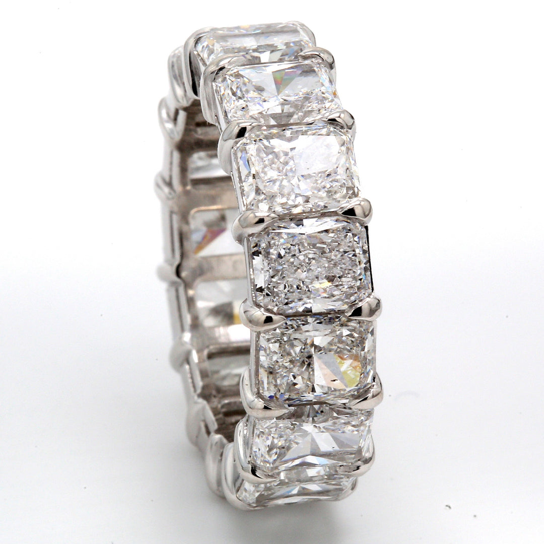 Eternity band in platinum with basket claw set GIA certified D-F/SI1-SI2 (15) radiant cut diamonds.  D10.58ct.t.w.  Size 6.5