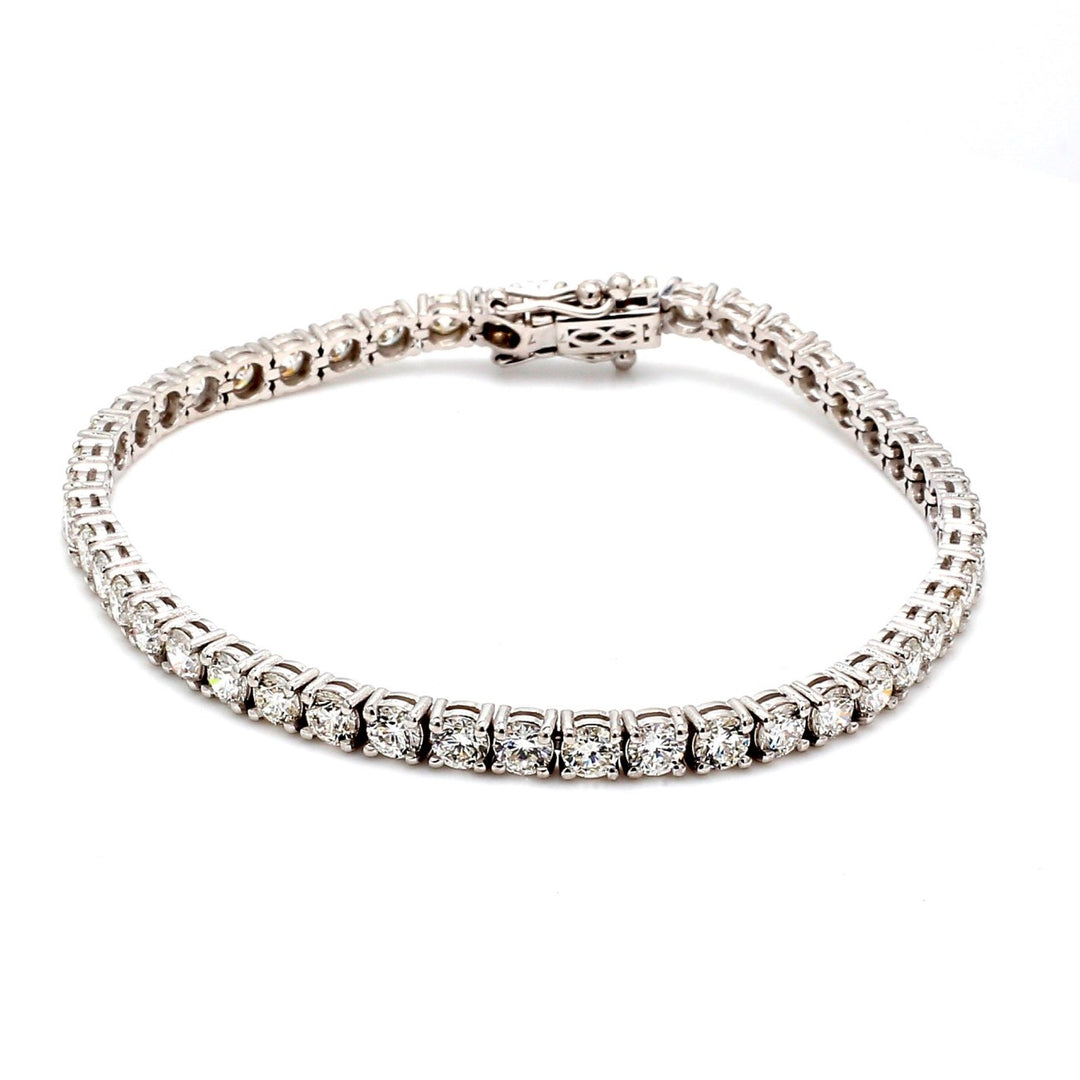 7"" Tennis bracelet with basket 4-prong set (46) round diamonds.  D8.06ct.t.w.