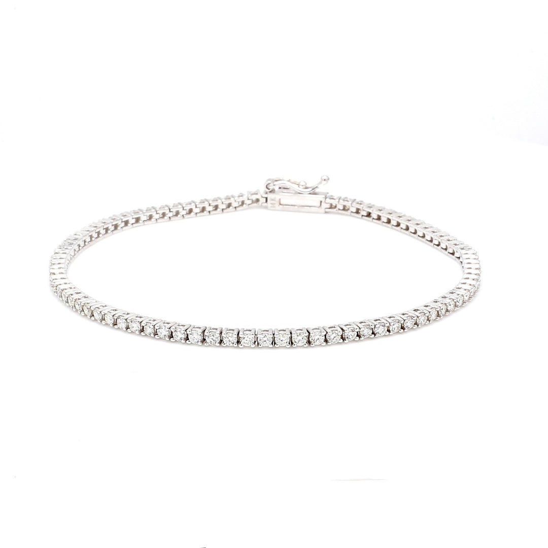 7"" Tennis bracelet with 4-prong basket set (63) round diamonds.  D3.98ct.t.w.