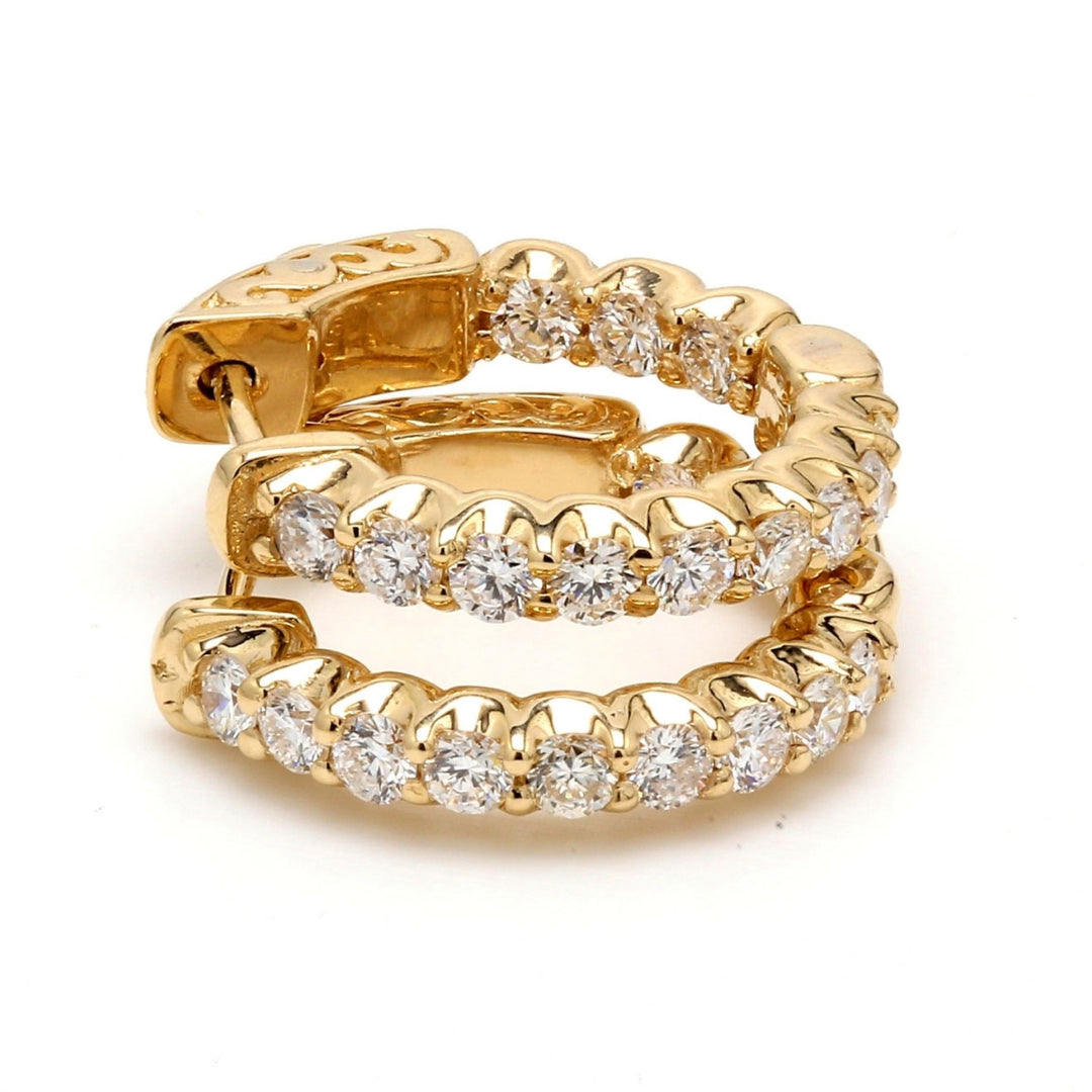 1.25"" Inside out hoop earring in 14K YG with prong set (36) round diamonds.  D6.70ct.t.w.