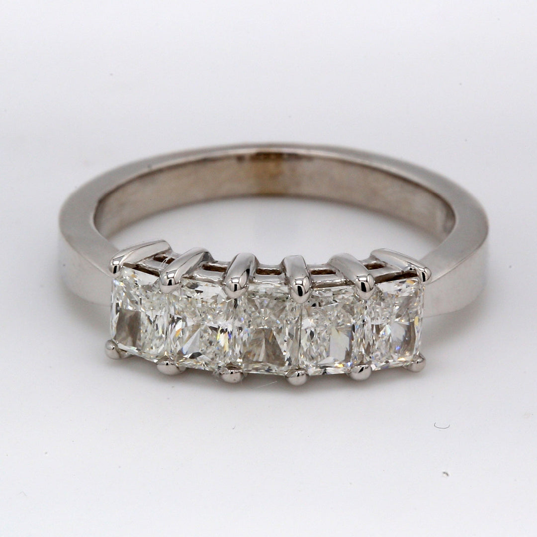 5-stone band with basket prong set radiant cut diamonds.  D1.32ct.t.w.  Size 7
