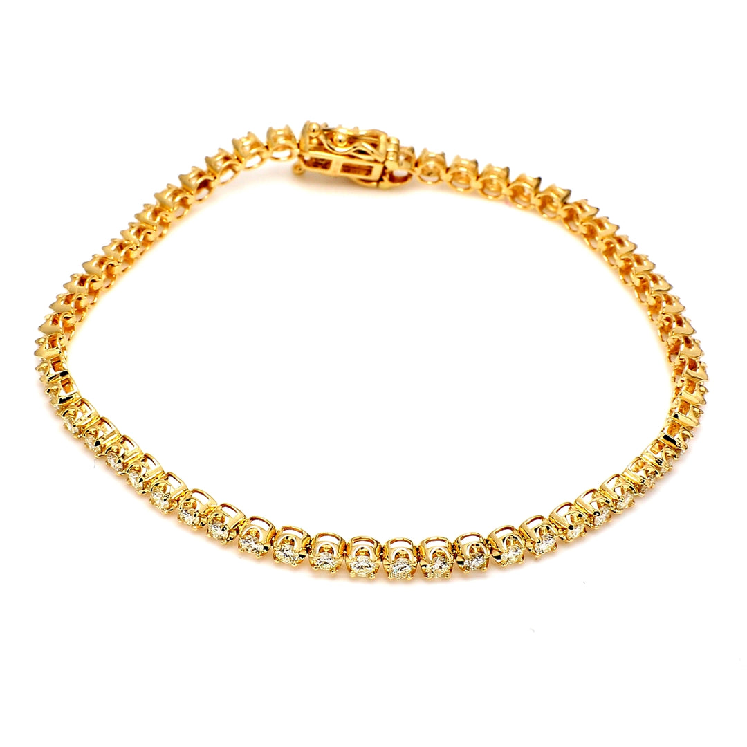 7"" Tennis  bracelet in 14K YG with crown head prong set (56) round diamonds.  D2.17ct.t.w.